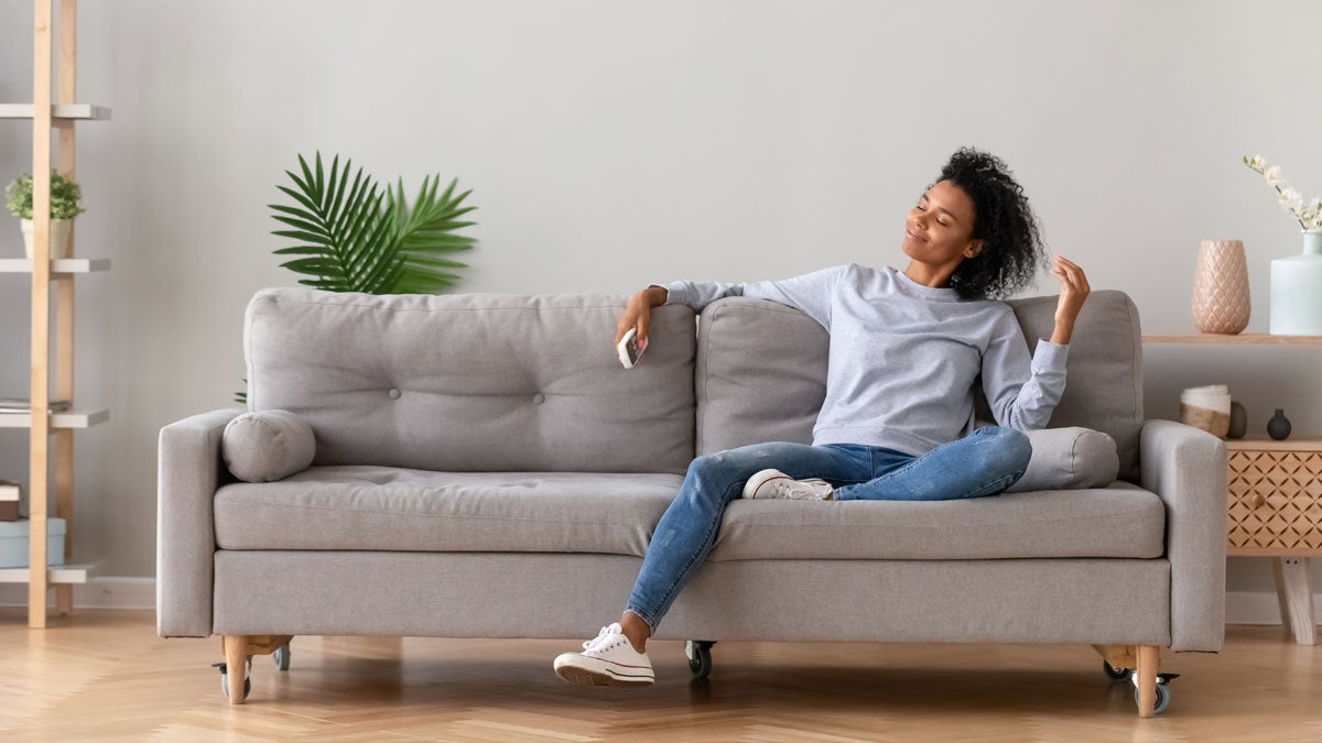 Happy women sitting on a clean couch