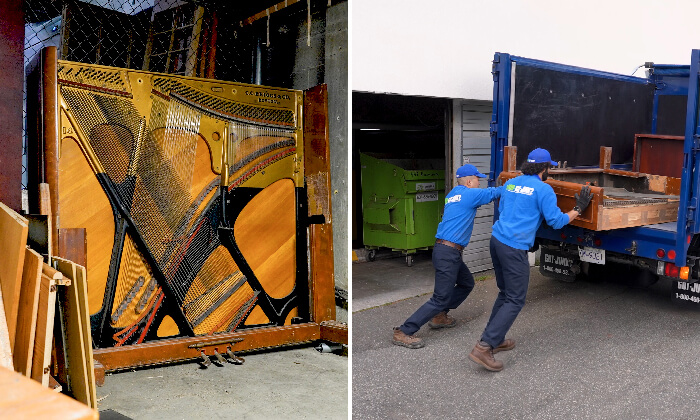 Two 1-800-GOT-JUNK? Truck Team Members removing a piano from the Vancouver Japanese Learning School  and putting it into the back of a truck.