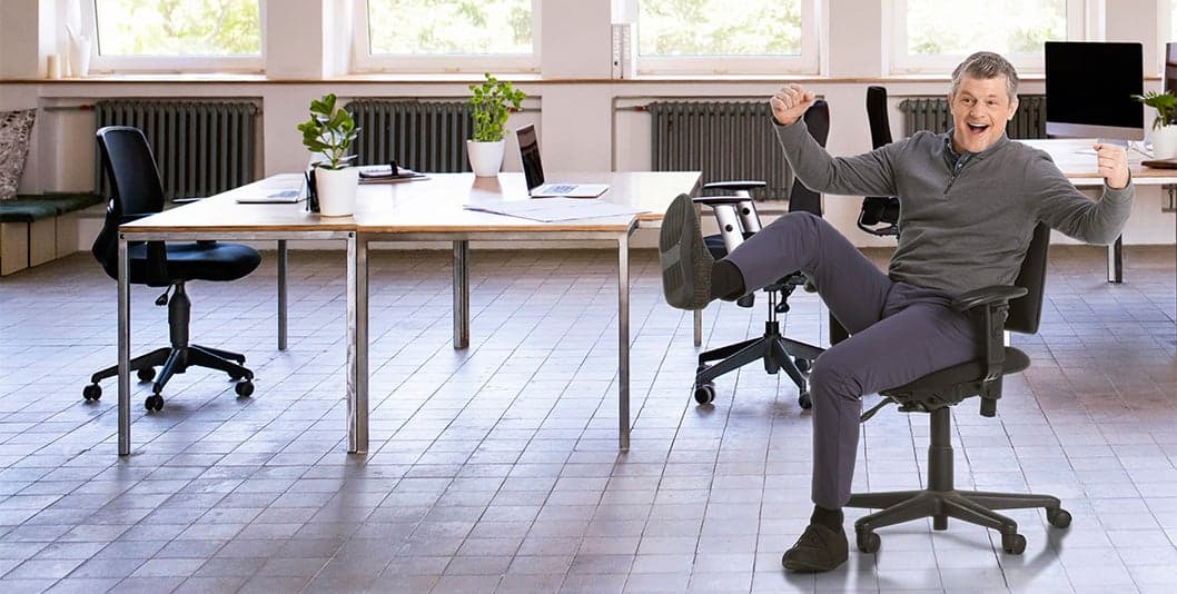 happy office manager in decluttered office