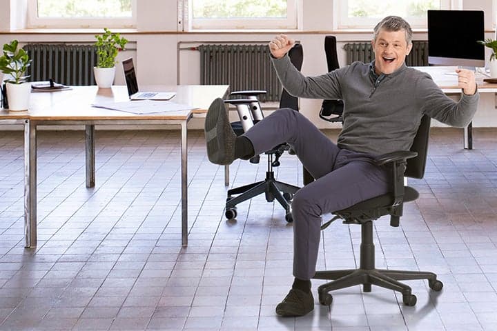 happy office manager in decluttered office