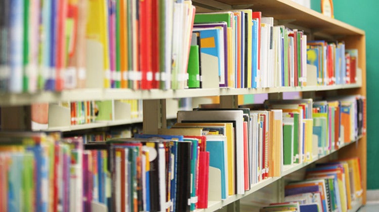 Library shelf with colorful books