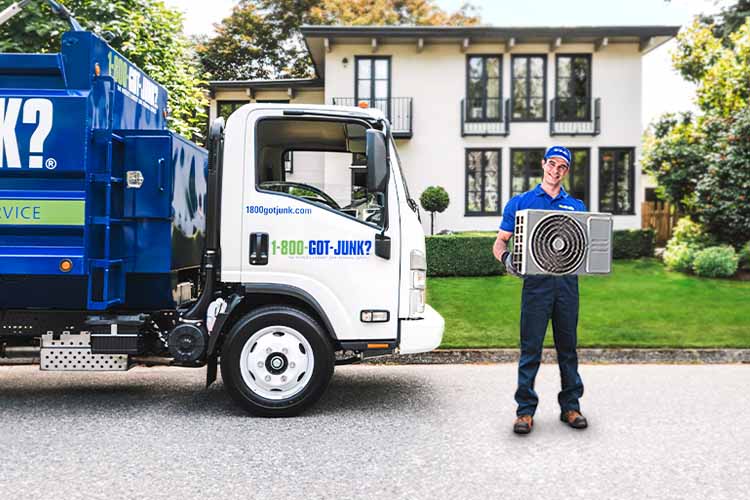 Air conditioner unit removed for recycling by 1-800-GOT-JUNK?