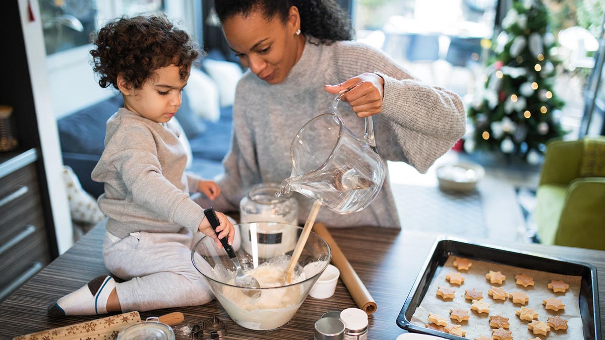 Mother and son baking cookies Mother and son baking cookies