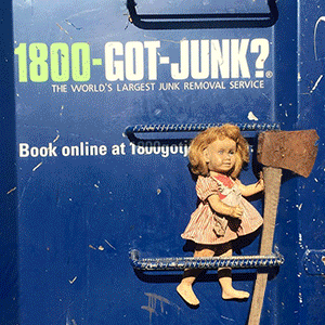 Old doll with Axe on 1-800-GOT-JUNK? truck