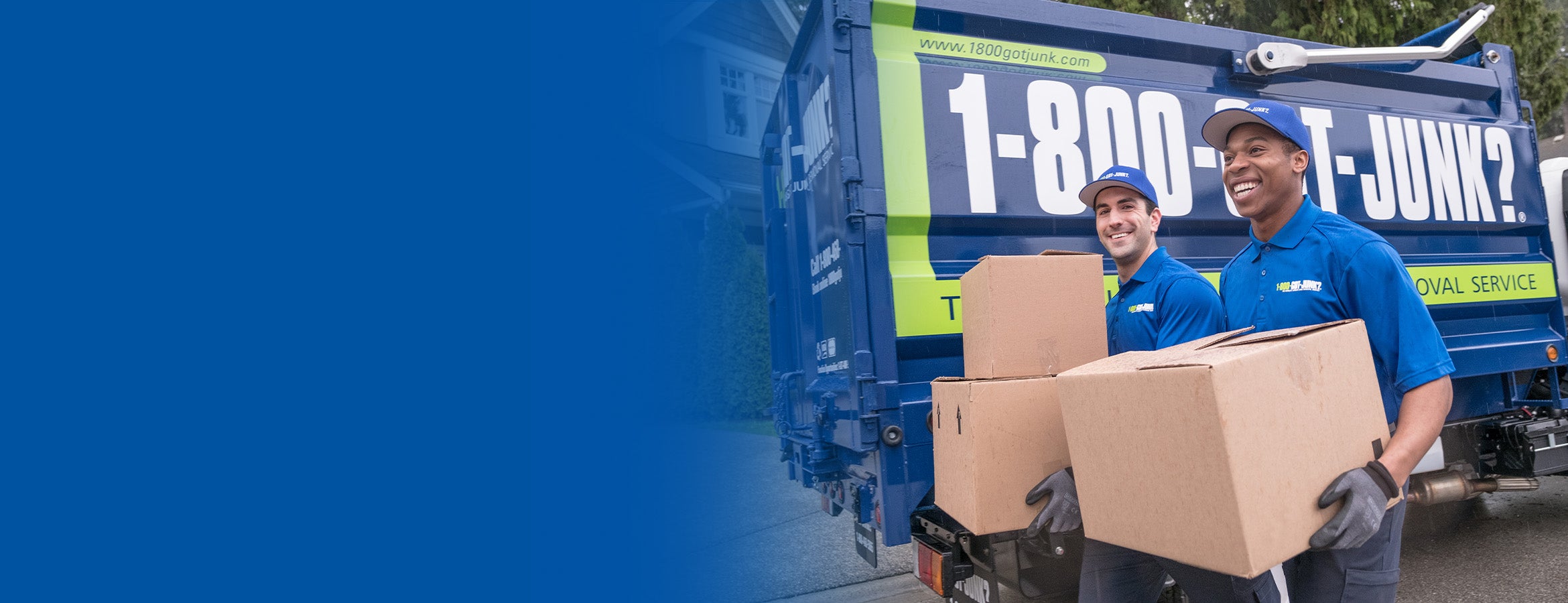 Truck team members carrying a box to dispose of a printer_Feature Image