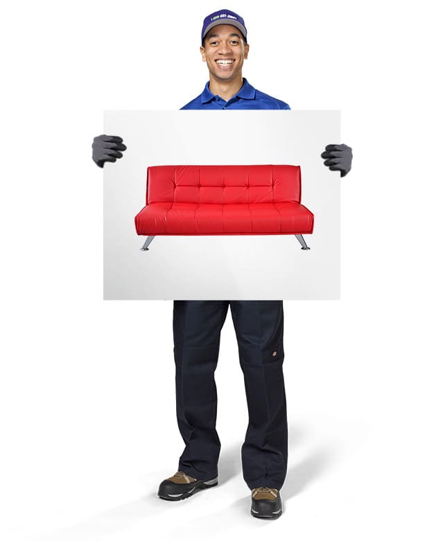 1-800-GOT-JUNK? Truck Team Member holding an image of a futon