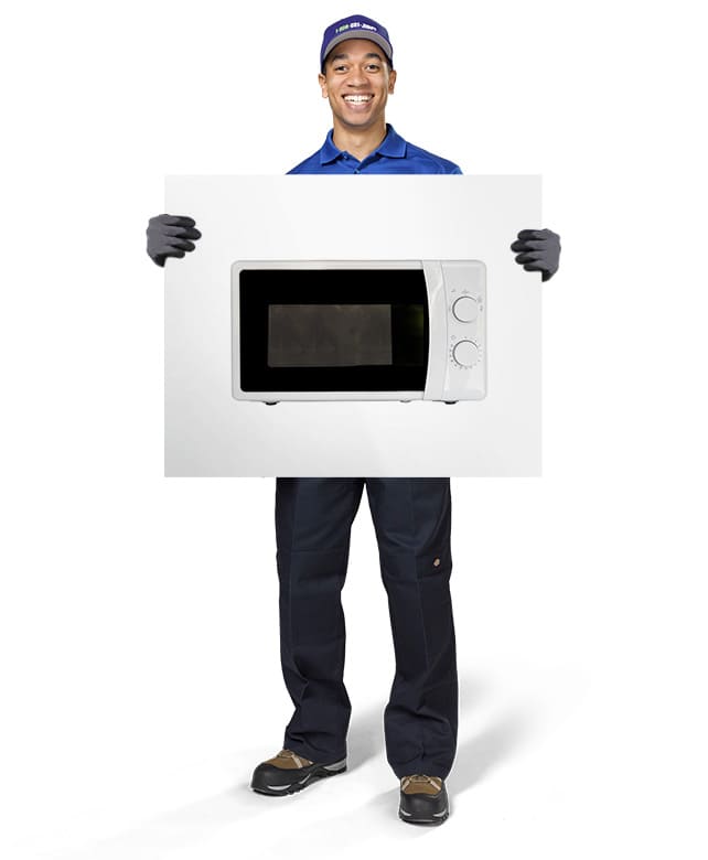 1-800-GOT-JUNK? Truck Team Member holding an image of a microwave