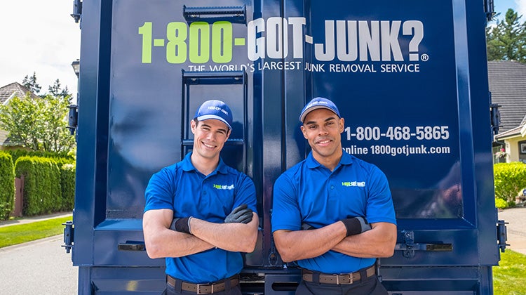 1-800-GOT-JUNK? Truck team ready to take away your old carpet