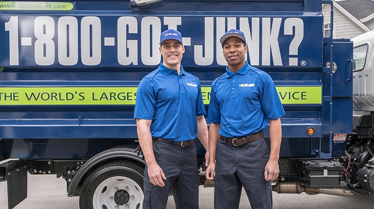 1-800-GOT-JUNK? Truck team disposing of concrete 1-800-GOT-JUNK? Truck team to dispose of concrete