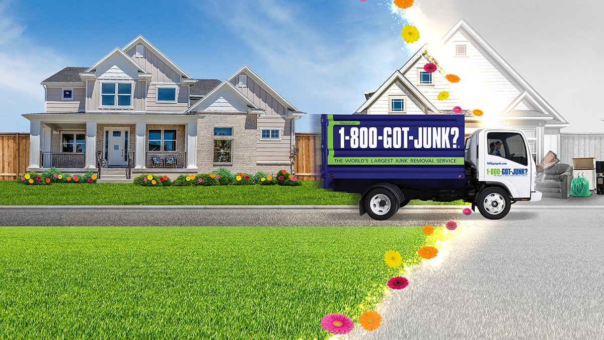 1-800-GOT-JUNK? truck driving down the street and the neighborhood brightens as the truck drives by 1-800-GOT-JUNK? truck driving down the street and the neighborhood brightens as the truck drives by