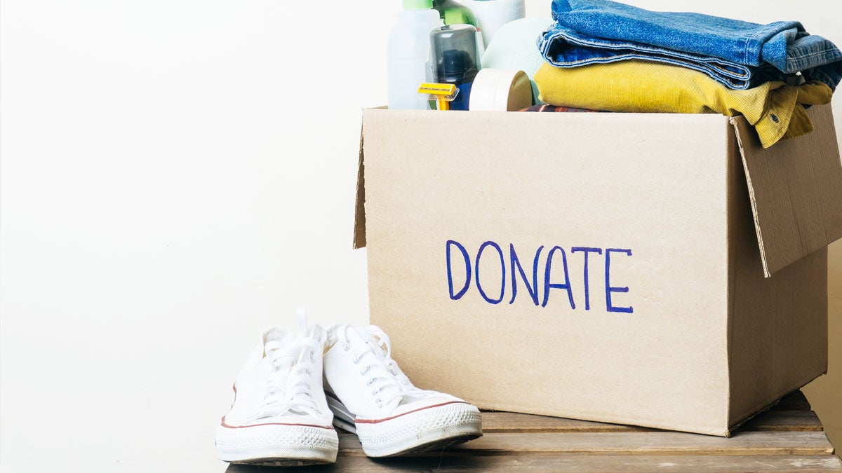 Donation box with shoes and clothes