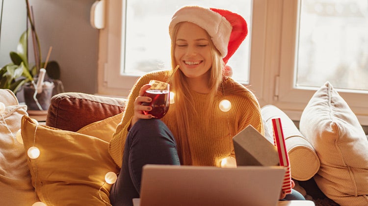 Woman participating in a virtual gift swap Woman participating in a virtual gift swap
