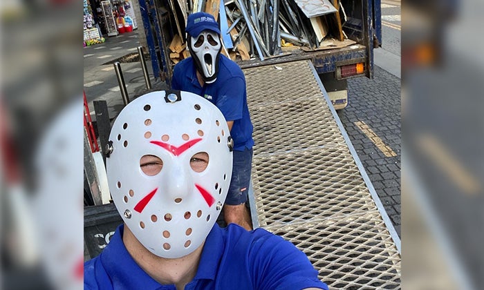 Spooky Junk - Friday the 13th Masks Two 1-800-GOT-JUNK? Truck Team Members in Friday the 13th Masks