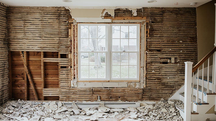 torn down walls with large window in the middle