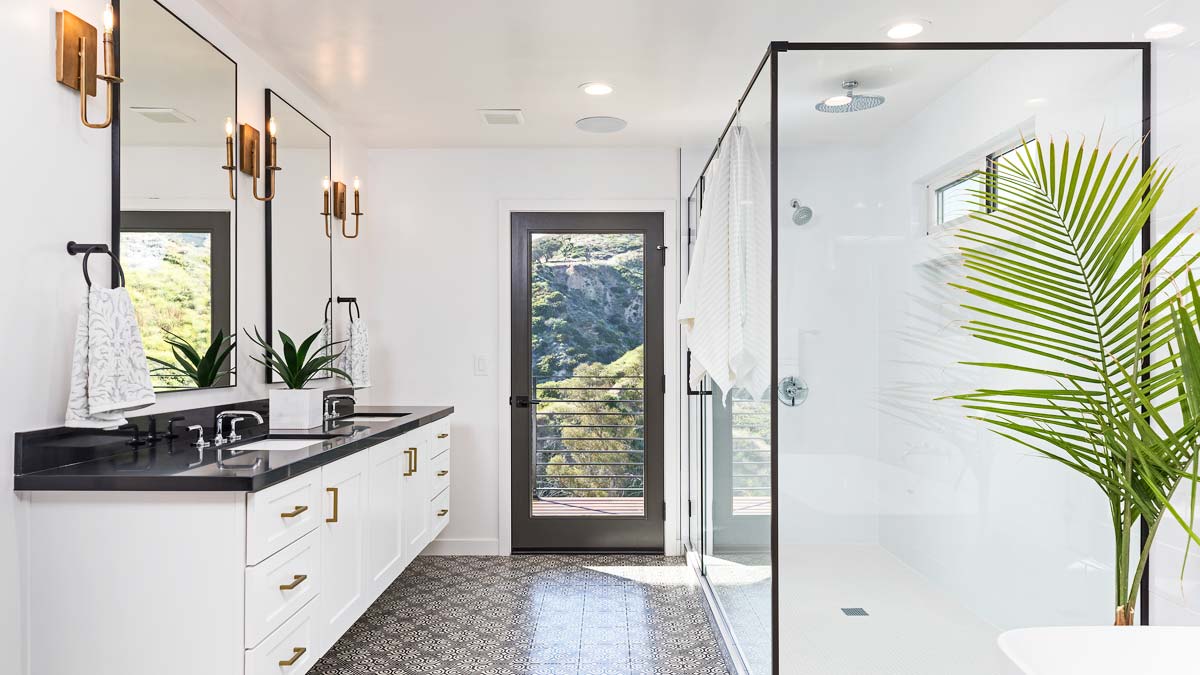 White bathroom with shower stall