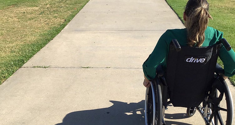 Woman in black wheelchair