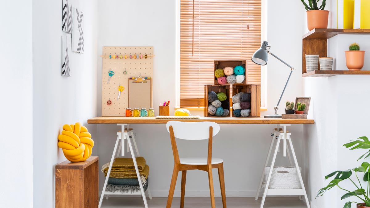 Organized desk space with table and chair