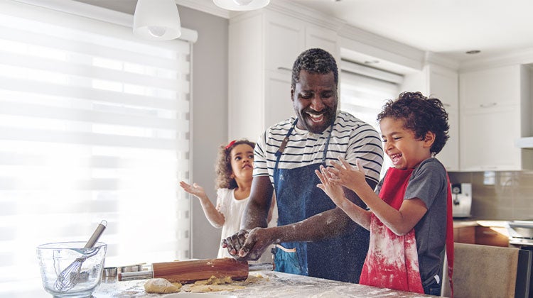 Family baking together in a clean kitchen 