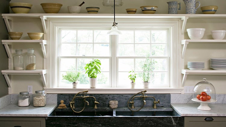 Organized kitchen with open concept cupboards Organized kitchen with open concept cupboards