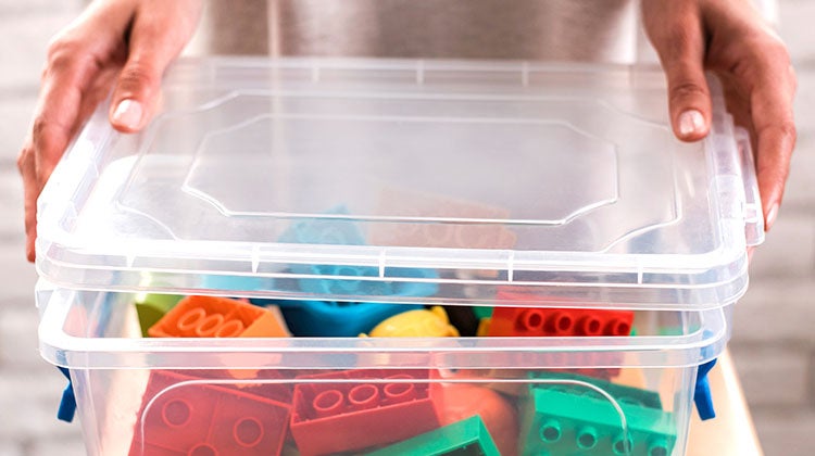 Clear storage box full of Lego 