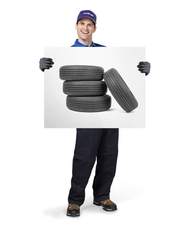 Tires for removal disposal or recycling by 1-800-GOT-JUNK? truck team member