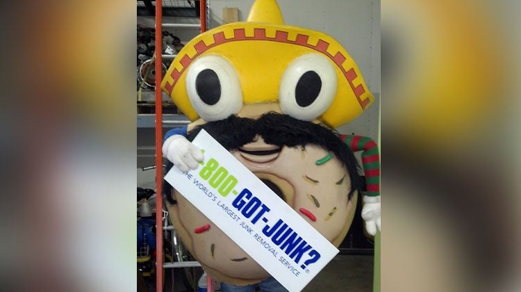 Donut mascot with a sombrero and mustache 