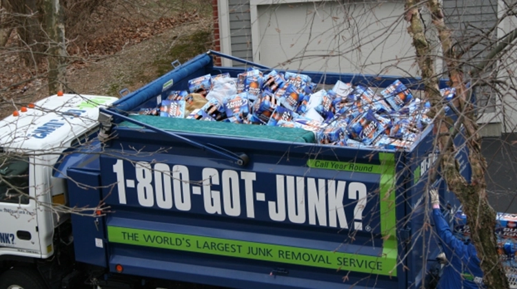 1-800-GOT-JUNK? truck full of Bud Light boxes